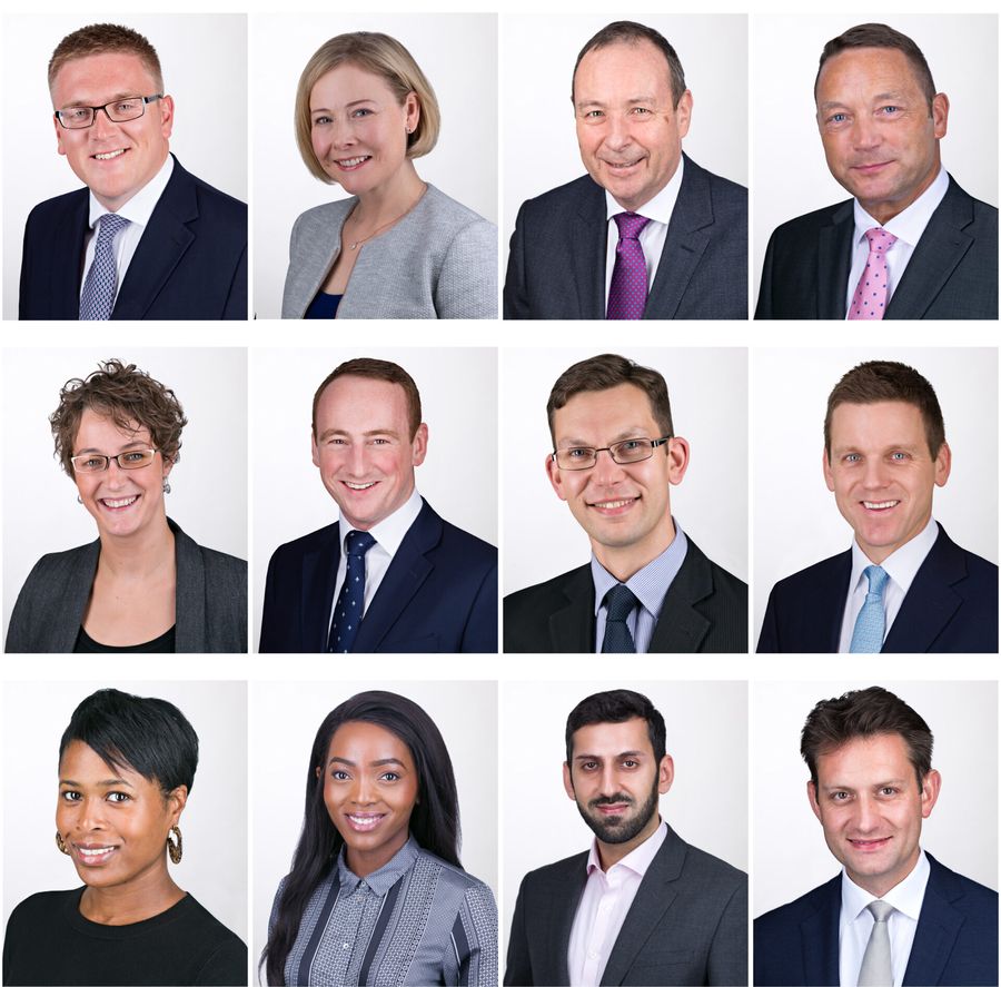 A grid of twelve team headshots with the same light background, lighting and crop